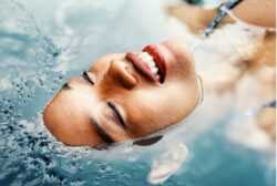 Woman face out of water